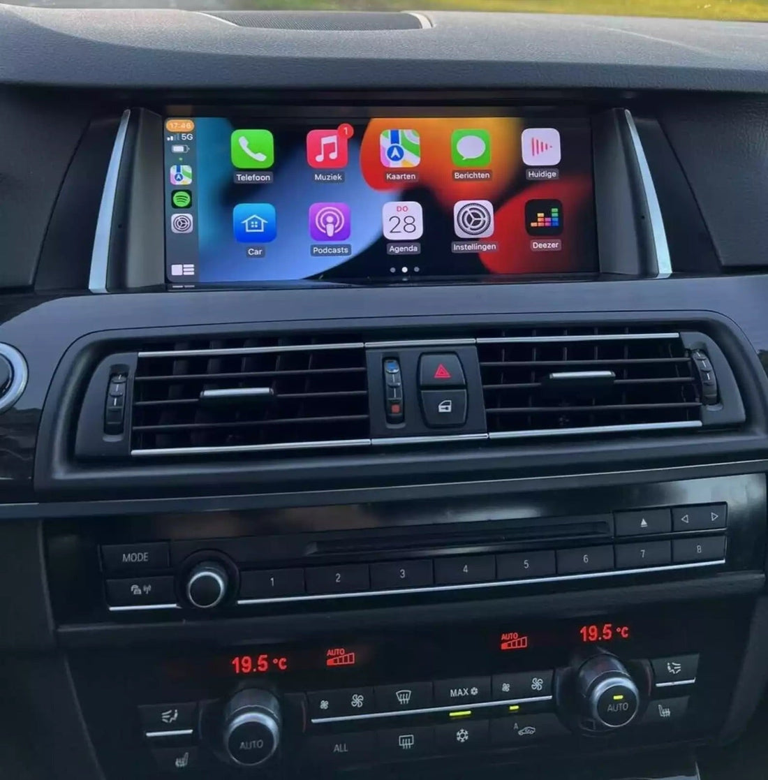 Apple CarPlay running on a factory car screen